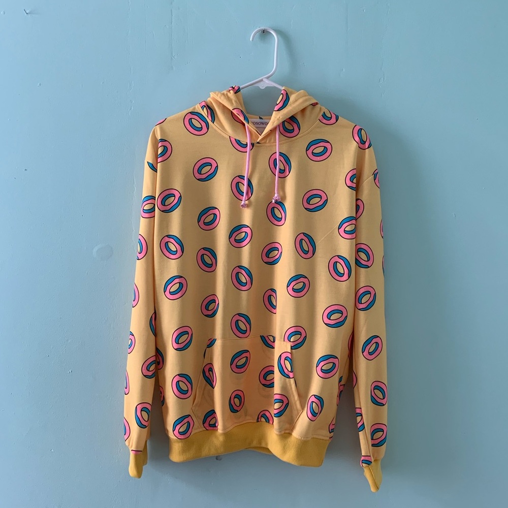 A trendy yellow donut hoodie.